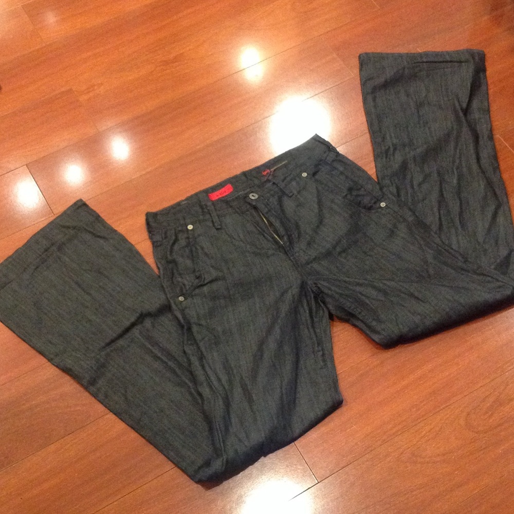 AG Adrienne Goldschmied The Flow black jeans.